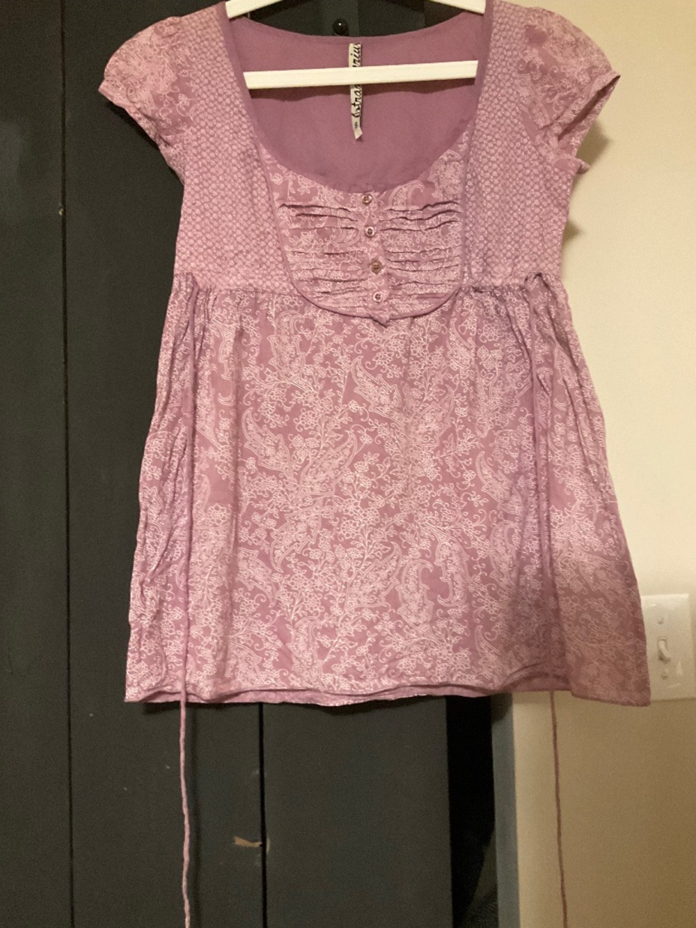 Light weight cotton…size small.